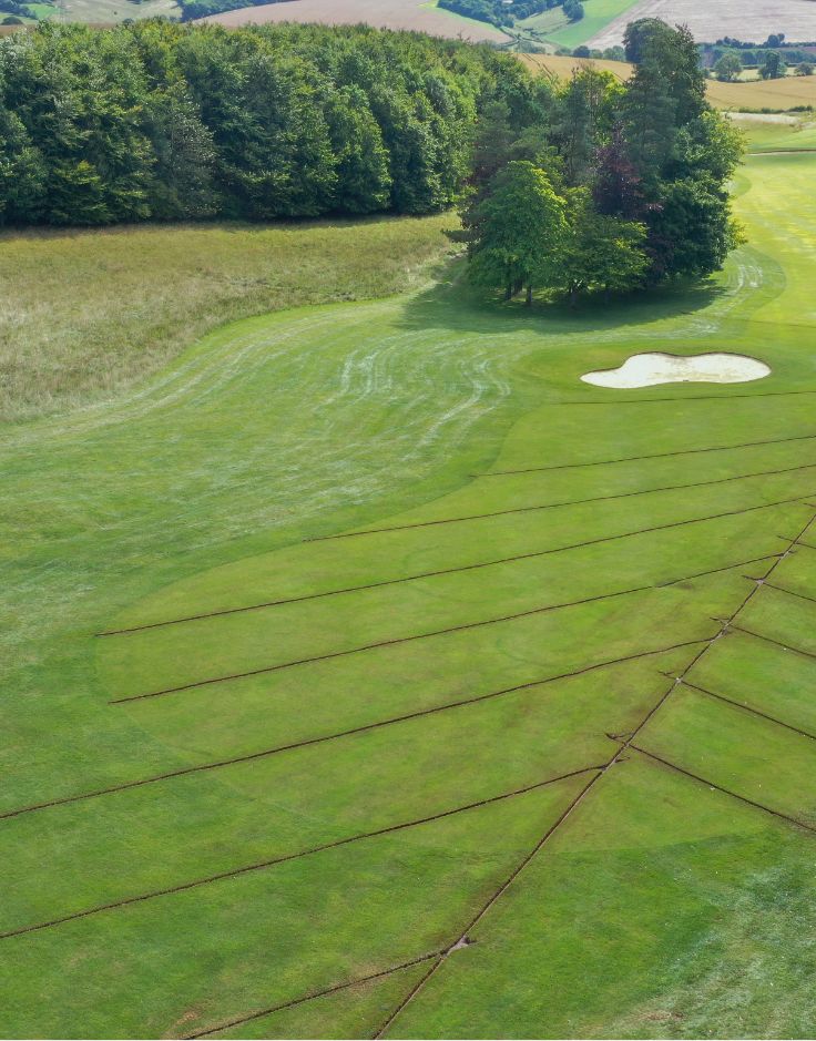 shot of sports field irrigation trenches
