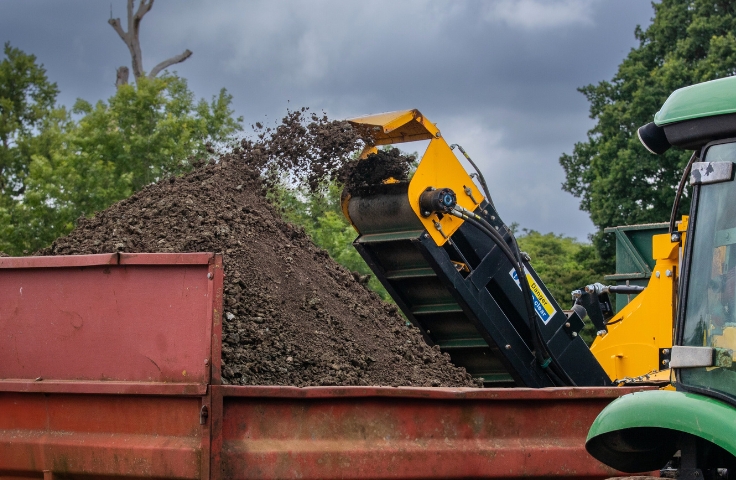 ground being excavated for sports drainage to go in