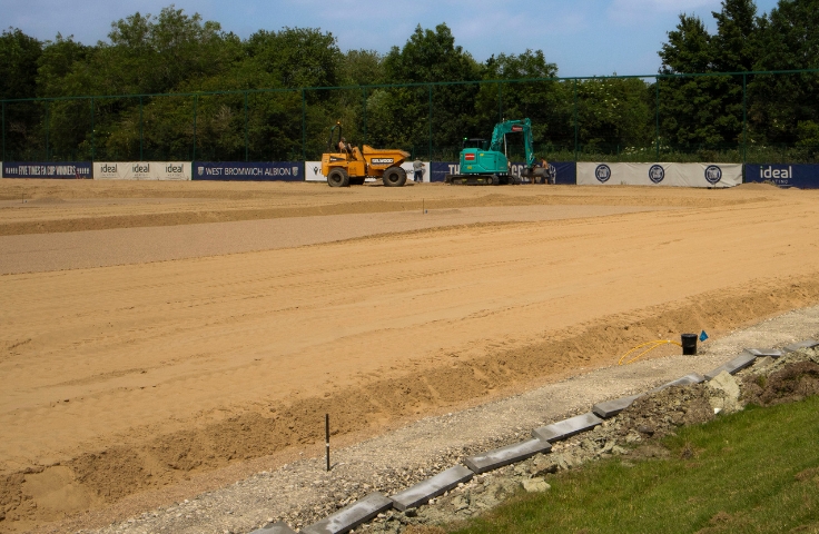 surface being prepared for sports pitch