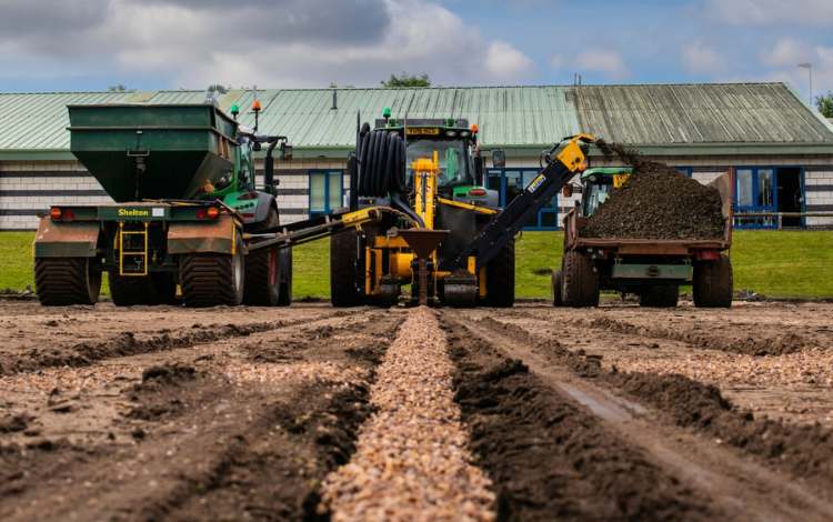 drainage channels being dug and filled
