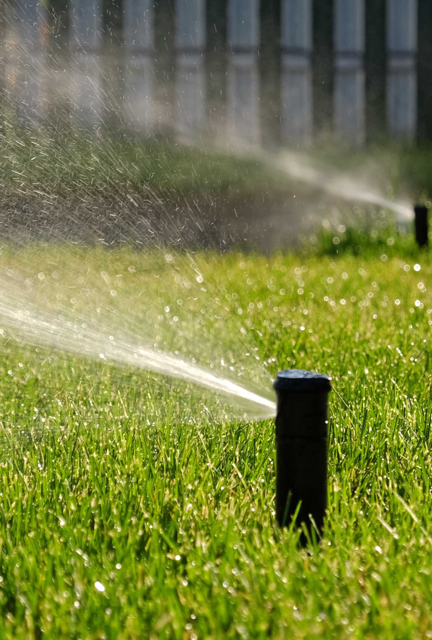 sports field irrigation sprinkler in action