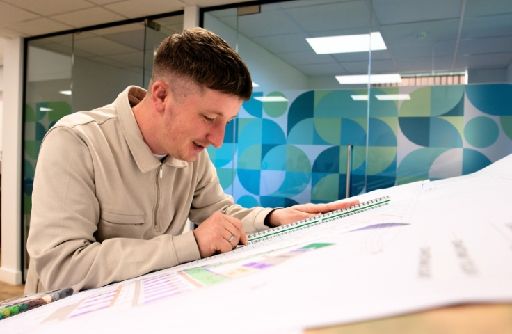 person designing a sports pitch