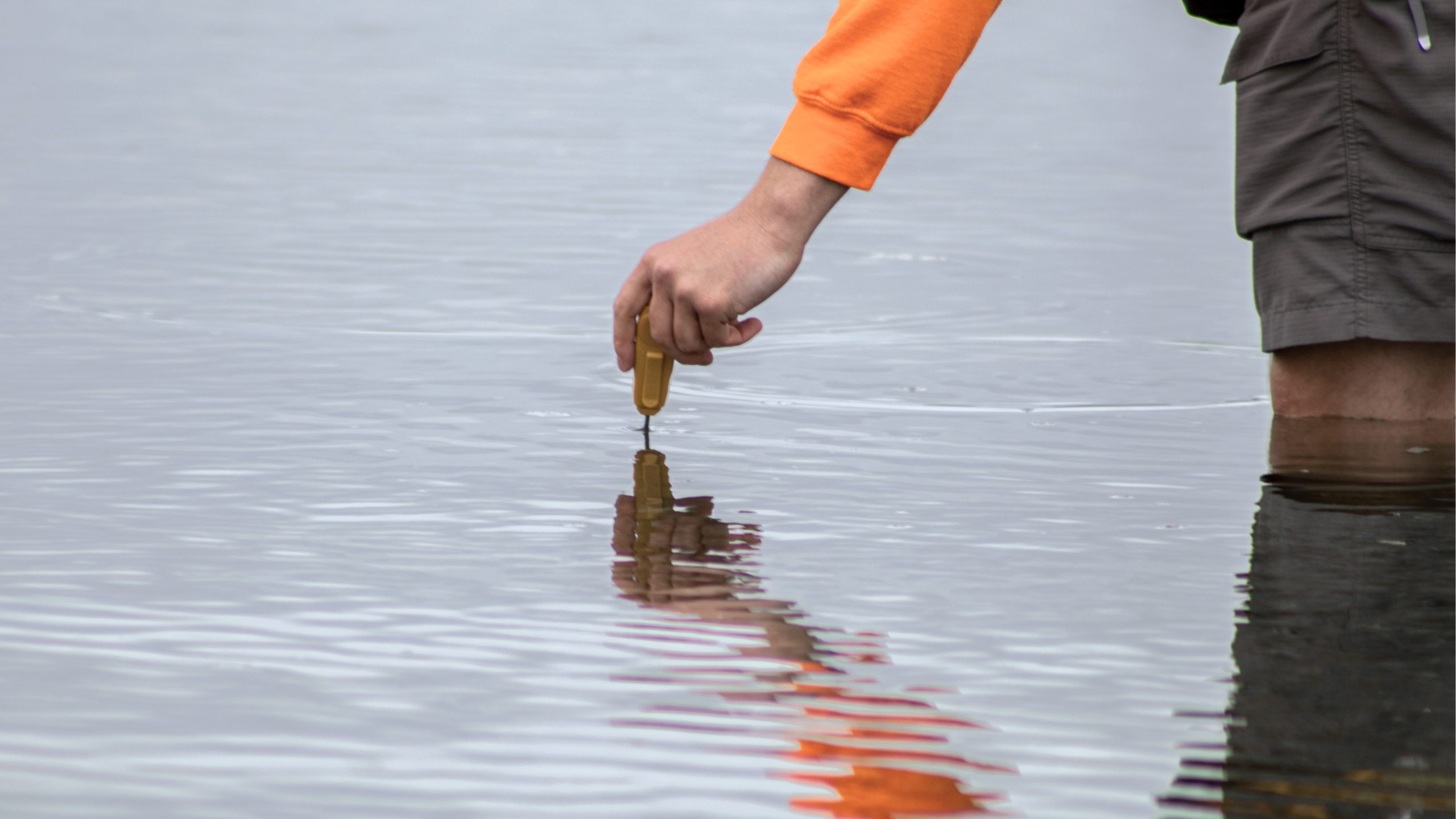 person testing water quality