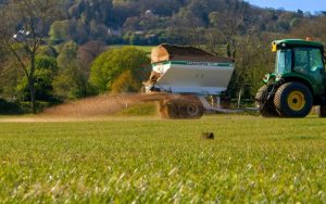Sports Pitch Maintenance underway with sand spreading