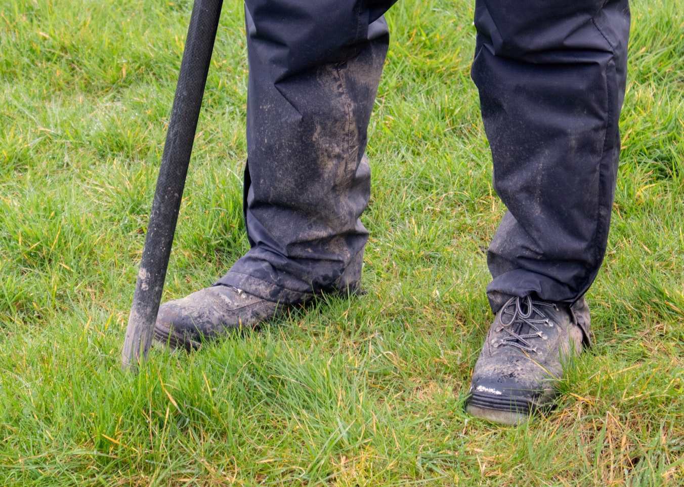 pair of site boots on grass