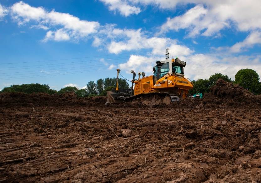 digger on mount of dirt