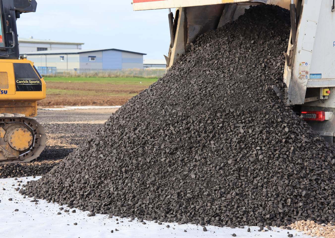 gravel being unloaded from a lorry